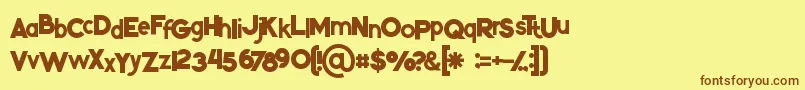フォントKikoregular – 茶色の文字が黄色の背景にあります。