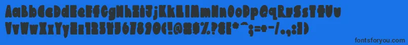 AustieBostChunkilicious Font – Black Fonts on Blue Background