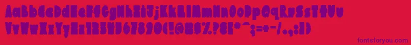 AustieBostChunkilicious Font – Purple Fonts on Red Background