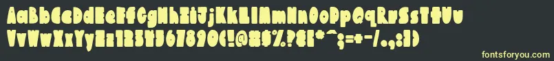 AustieBostChunkilicious Font – Yellow Fonts on Black Background