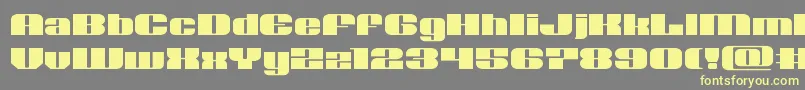 フォントNolocontendreexpand – 黄色のフォント、灰色の背景