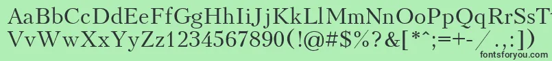 フォントUkrainiankudriashov – 緑の背景に黒い文字