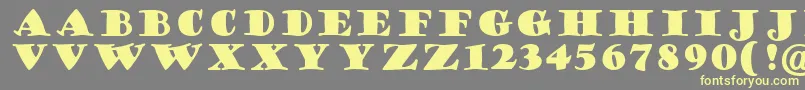 Шрифт GoudyStout – жёлтые шрифты на сером фоне
