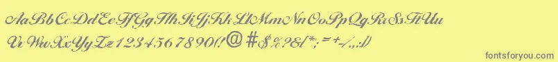 BallantinesantiqueXboldRegular-fontti – harmaat kirjasimet keltaisella taustalla