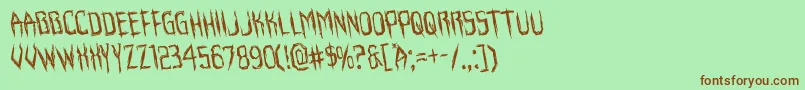 Horroroidrotate Font – Brown Fonts on Green Background