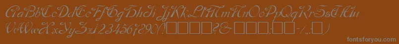 DobkinPlain-fontti – harmaat kirjasimet ruskealla taustalla