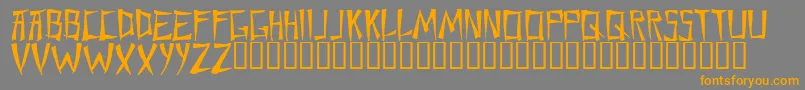 フォントChane – オレンジの文字は灰色の背景にあります。