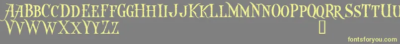 Captkd Font – Yellow Fonts on Gray Background