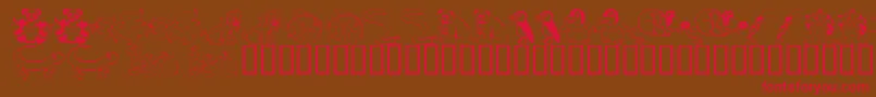フォントKrLilBuddies – 赤い文字が茶色の背景にあります。