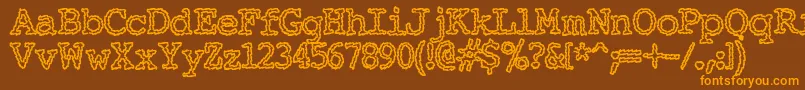 Elechac ffy Font – Orange Fonts on Brown Background