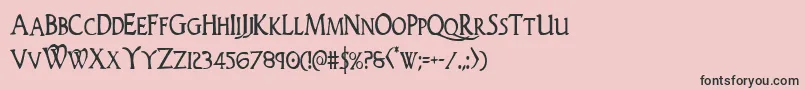 フォントWoodgodcond – ピンクの背景に黒い文字