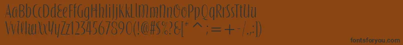 Police SilvermoonItcBold – polices noires sur fond brun