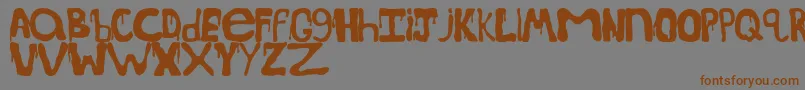 SpoookydripsRegular Font – Brown Fonts on Gray Background