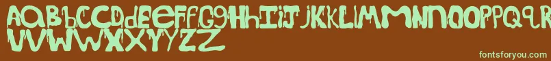 SpoookydripsRegular Font – Green Fonts on Brown Background