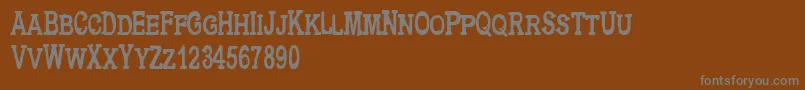 Cfmetropolisserif Font – Gray Fonts on Brown Background