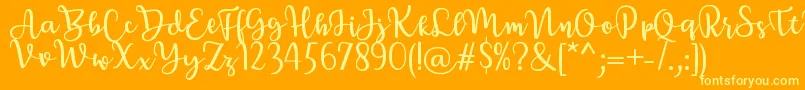 BreettyRegular-Schriftart – Gelbe Schriften auf orangefarbenem Hintergrund