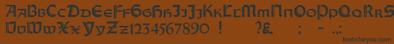 フォントOrotundCapitalsHeavy – 黒い文字が茶色の背景にあります