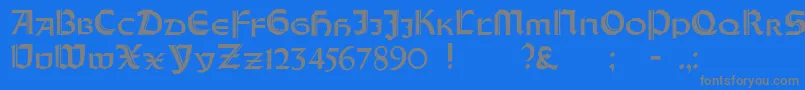 フォントOrotundCapitalsHeavy – 青い背景に灰色の文字