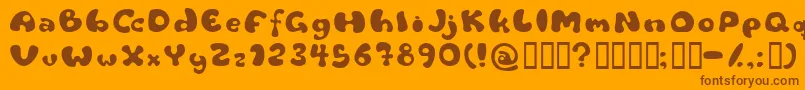 Flattyre-fontti – ruskeat fontit oranssilla taustalla