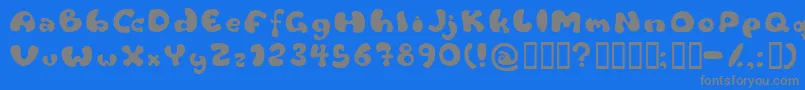 フォントFlattyre – 青い背景に灰色の文字