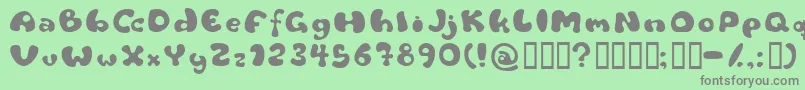 フォントFlattyre – 緑の背景に灰色の文字