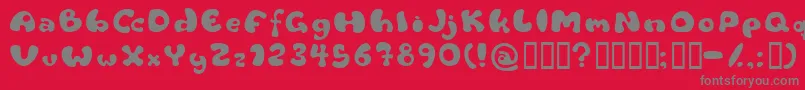 フォントFlattyre – 赤い背景に灰色の文字