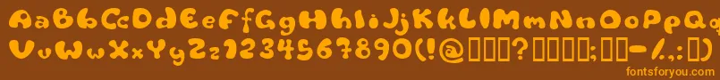フォントFlattyre – オレンジ色の文字が茶色の背景にあります。