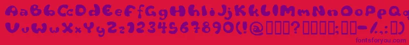 Шрифт Flattyre – фиолетовые шрифты на красном фоне