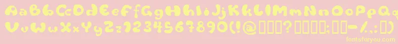 Flattyre-fontti – keltaiset fontit vaaleanpunaisella taustalla