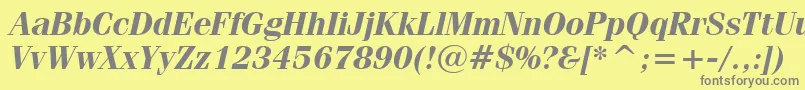Fenicebi-fontti – harmaat kirjasimet keltaisella taustalla