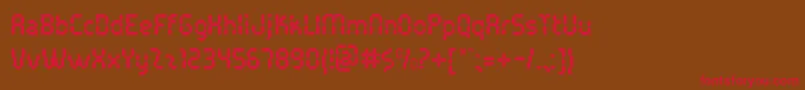 フォントPocketCalcuatlorOt – 赤い文字が茶色の背景にあります。
