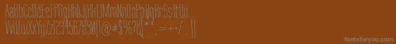 Шрифт LabtopWarp1 – серые шрифты на коричневом фоне