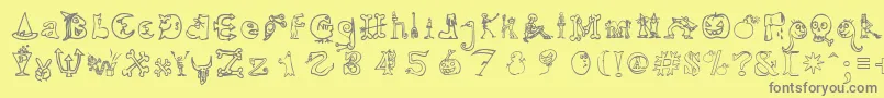 HalloweenUnregistered-fontti – harmaat kirjasimet keltaisella taustalla