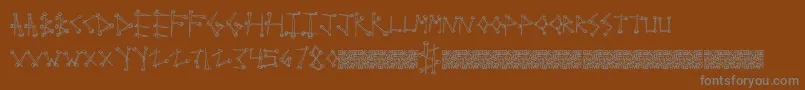 Supertack Font – Gray Fonts on Brown Background