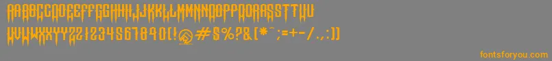 フォントChopschops – オレンジの文字は灰色の背景にあります。