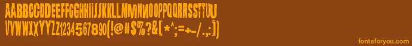 フォントLugosi – オレンジ色の文字が茶色の背景にあります。