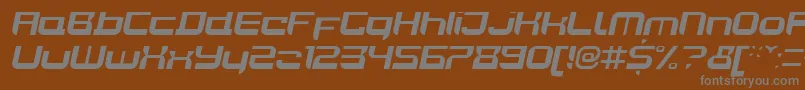 JoyriderBolditalic-fontti – harmaat kirjasimet ruskealla taustalla