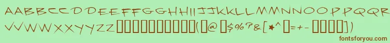 フォントKrazynights – 緑の背景に茶色のフォント