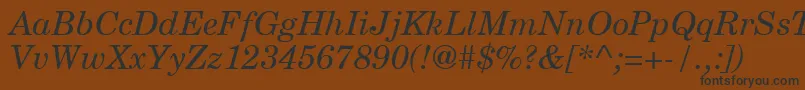 NewmilleniumschlbkItalicsh Font – Black Fonts on Brown Background