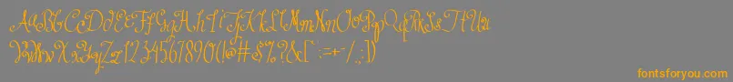 フォントAustieBostDustIntoDiamonds – オレンジの文字は灰色の背景にあります。