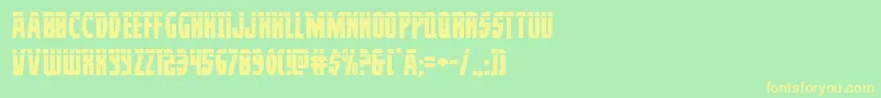 フォントProwlerlas – 黄色の文字が緑の背景にあります