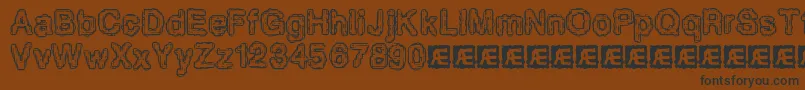 PixelKrudBrk Font – Black Fonts on Brown Background