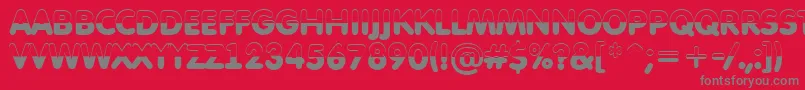 AFuturaroundtitulbwBold-fontti – harmaat kirjasimet punaisella taustalla