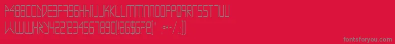 Czcionka EscapeArtistCondensed – szare czcionki na czerwonym tle