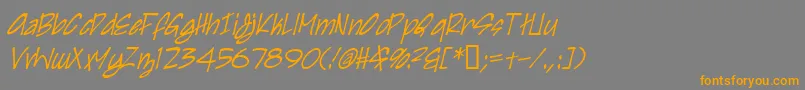 フォントIrezumiItalic – オレンジの文字は灰色の背景にあります。