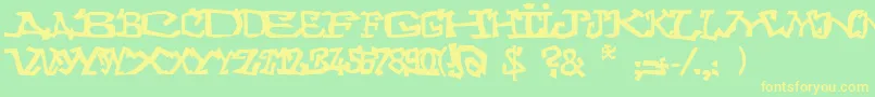 Graffitithree Font – Yellow Fonts on Green Background