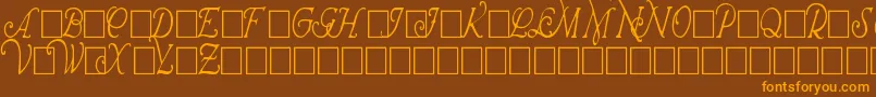 WrennInitialsCondensed-fontti – oranssit fontit ruskealla taustalla
