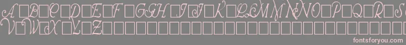 WrennInitialsCondensed-fontti – vaaleanpunaiset fontit harmaalla taustalla