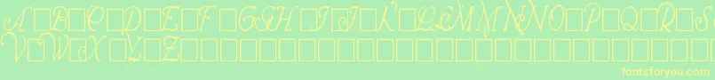 WrennInitialsCondensed-fontti – keltaiset fontit vihreällä taustalla