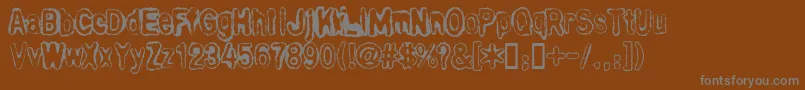 BullOutline-Schriftart – Graue Schriften auf braunem Hintergrund